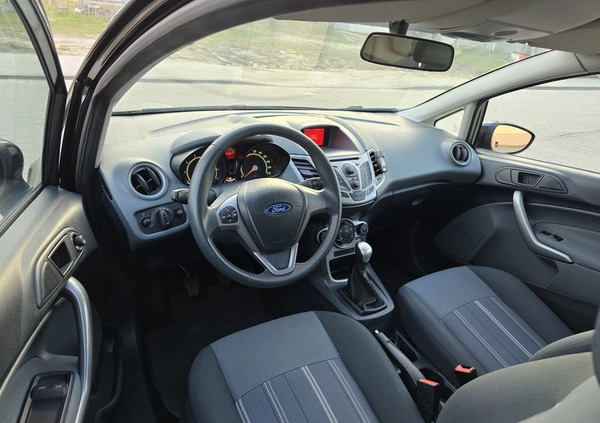 Ford Fiesta cena 16900 przebieg: 180000, rok produkcji 2009 z Bełchatów małe 254